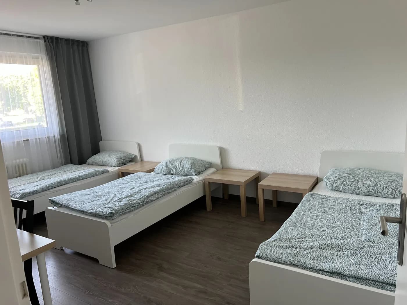 Geräumiges Mehrbettzimmer für ein Monteurteam in Dormagen