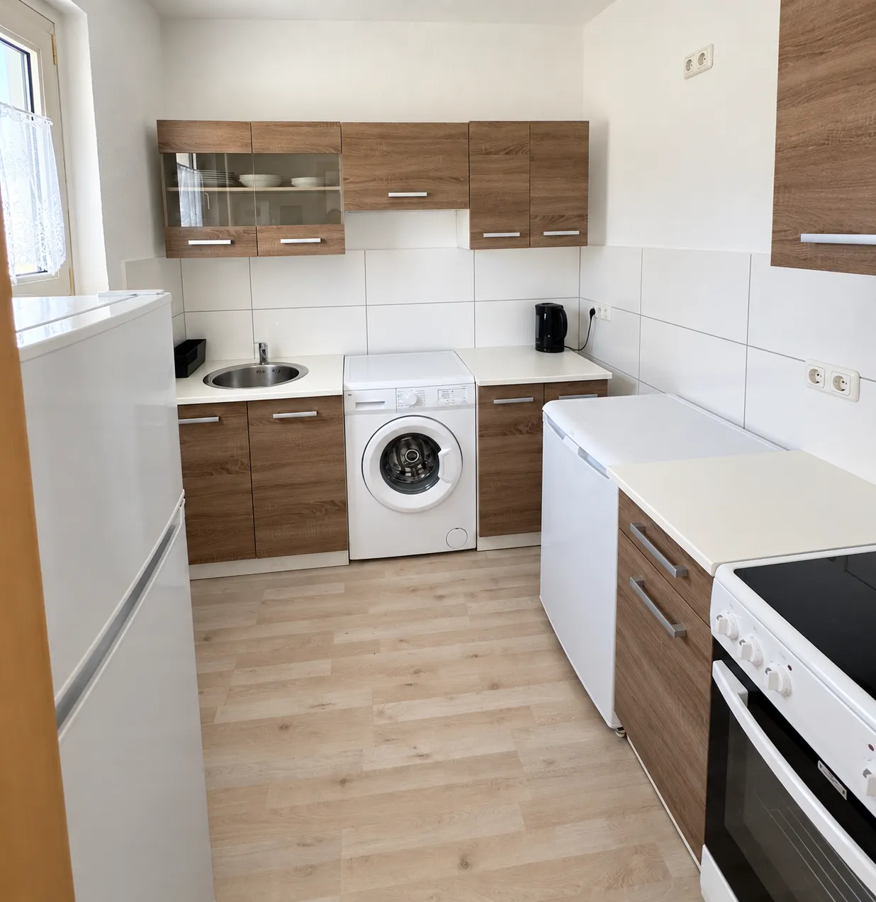 Wohnungsbeispiel: Küche mit Herd und Waschmaschine